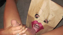 Protects herself from sperm by wearing a paper bag over her head