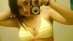 Amazing teen with big tits teasing and stripping