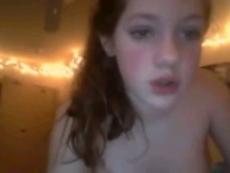 Redhead teen fingering on webcam